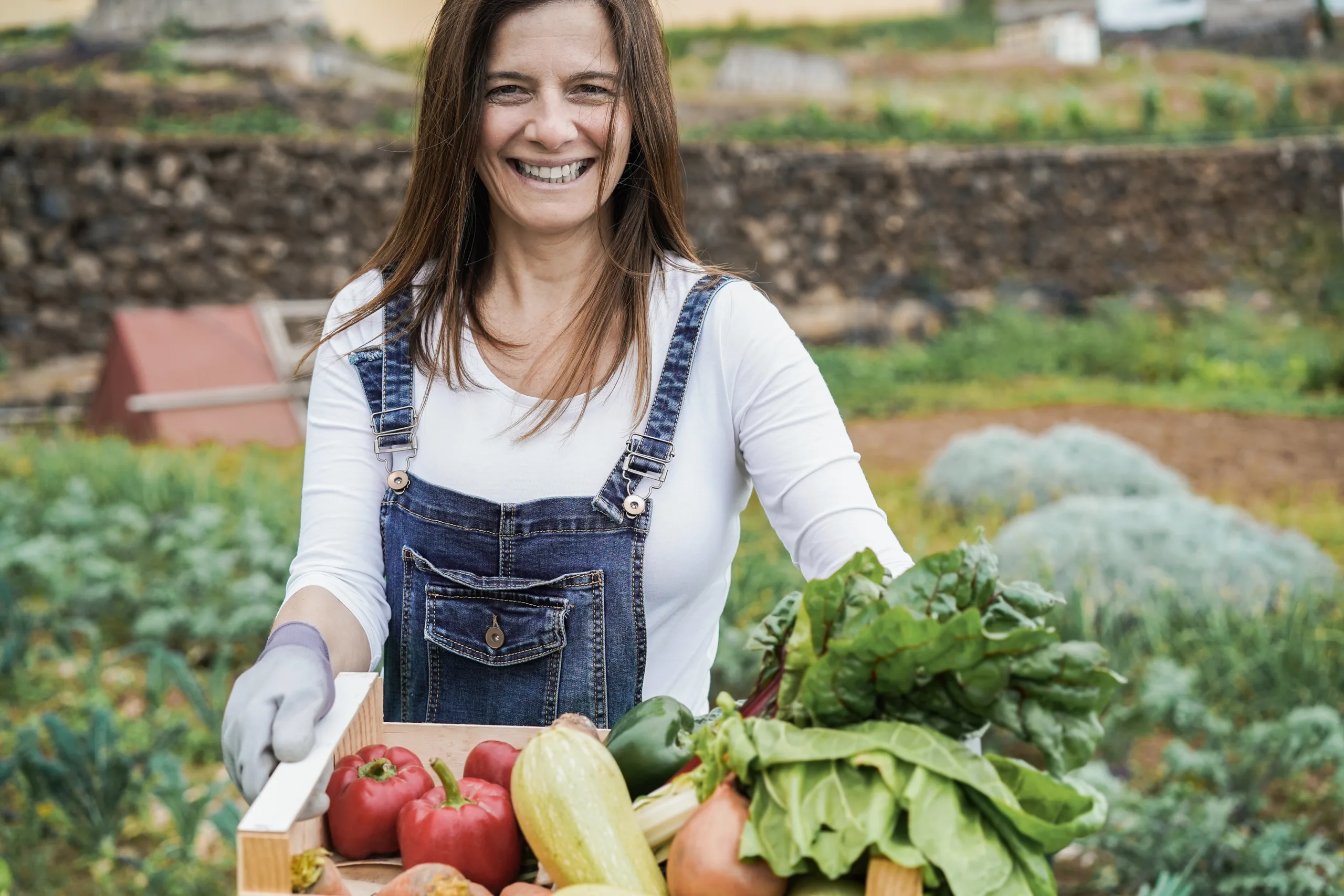Dietician in Abbotsford holding basket of fresh produce from a local farm