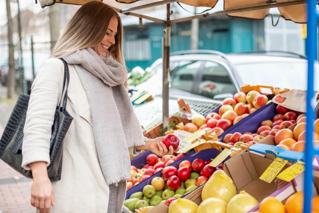 Langley dietician picking fruits from farmers market