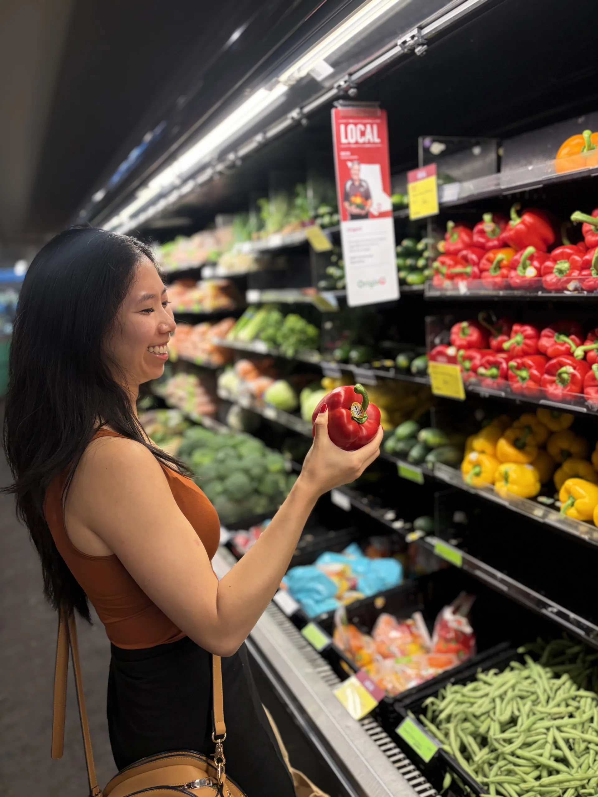 Helen Tieu, Registered Dietitian, grocery shopping for vegetables